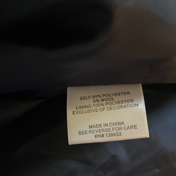 Navy blue vest with specks of yellow and red design. - Picture 5 of 6